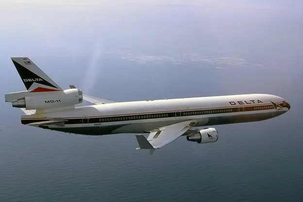 MD11 flying above water