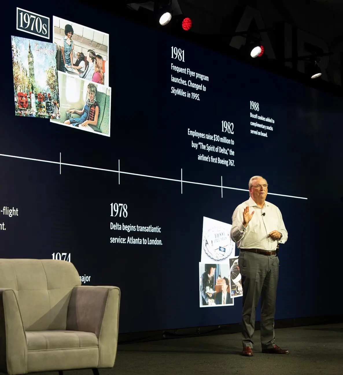 Man giving presentation on stage