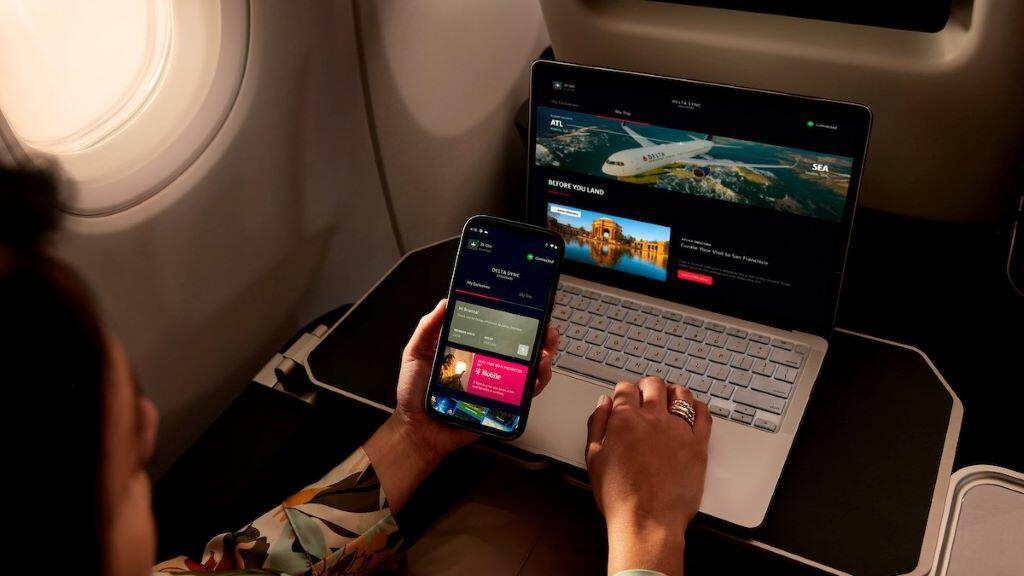 A Delta customer accesses Delta Sync using Delta's free Wi-Fi.